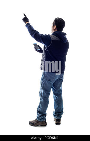 Lost male hiker or tourist using gps navigation on cell phone to look at a digital map. Isolated on a white background for composites or copy space. Stock Photo