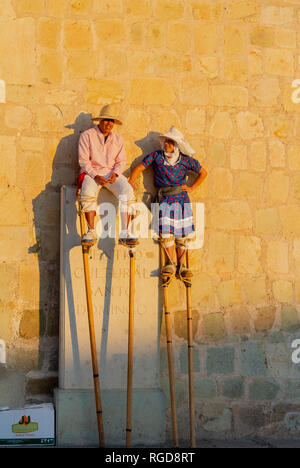 Local men wearing stilts, oaxaca, mexico Stock Photo