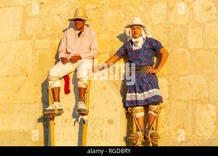 Local men wearing stilts, oaxaca, mexico Stock Photo