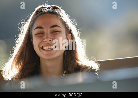 Portrait of smiling teenage girl Stock Photo