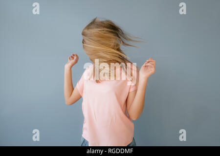 Young woman with hair covering her face Stock Photo