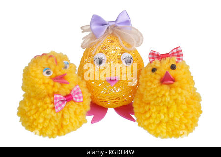 Easter homemade, chicken mother and chickens kids  made of cloth and thread. Isolated on white studio macro shot Stock Photo
