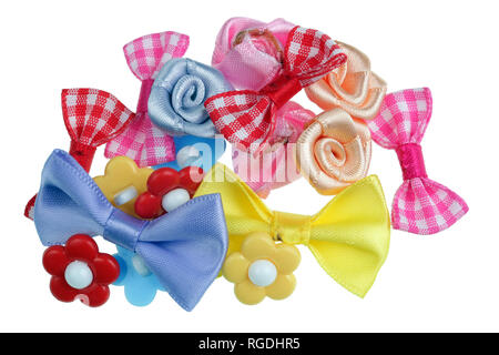 Cotton and satin bows with clay flowers for homemade Easter handicrafts. Isolated on white studio macro shot Stock Photo