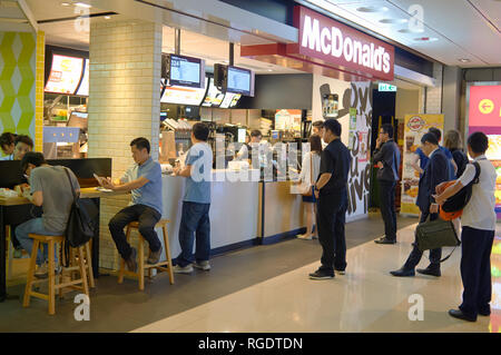 HONG KONG - MAY 05, 2015: counter service in a McDonald's restaurant. Stock Photo
