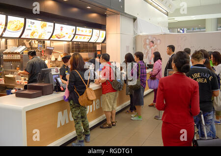 HONG KONG - MAY 06, 2015: counter service in a McDonald's restaurant. Stock Photo