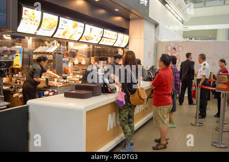 HONG KONG - MAY 06, 2015: counter service in a McDonald's restaurant. Stock Photo