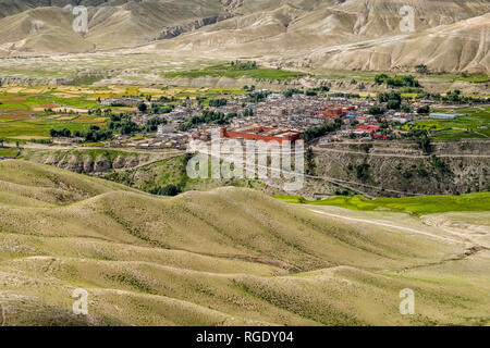 Panoramic aerial view on the town, the agricultural surroundings and the barren landscape of Upper Mustang Stock Photo