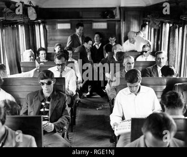 workers on the train in porta romana, milan 1960 Stock Photo