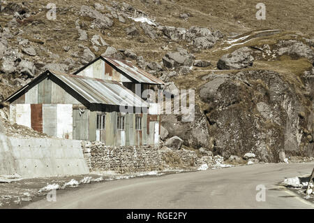 View of Military camp on a highway road side to Nathula Pass of India China border near Nathu La mountain pass in the Himalayas which connects Indian  Stock Photo