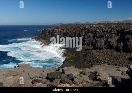 Dramatic Atlantic sea scene, Along the coastline of the Rubicon Desert, Playa Blanca, Lanzarote, Canary Islands, Spain. Stock Photo