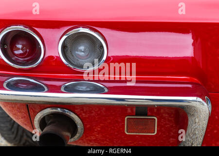 Rear view of an American sports car of the sixties Stock Photo