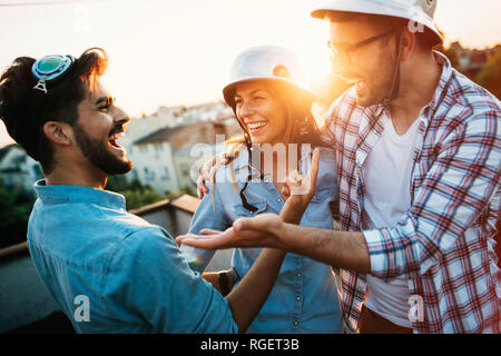 Group of friends partying on terrace Stock Photo