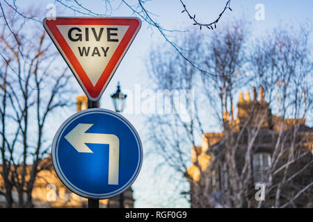 Give Way and Turn left Stock Photo