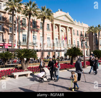 Family walking past the Town Hall or Casa Consistorial in Murcia, Spain, Europe Stock Photo