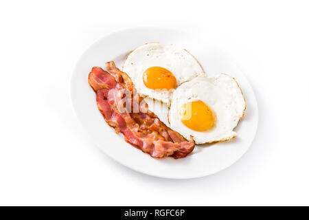 Fried eggs and bacon for breakfast isolated on white background. Stock Photo