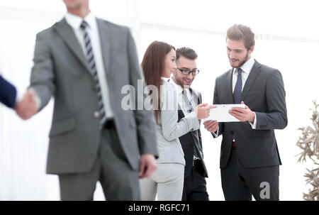 businessman shaking hands to seal a deal with his partner Stock Photo