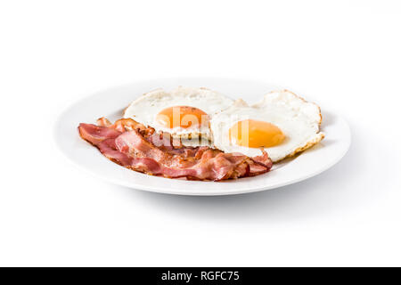 Fried eggs and bacon for breakfast isolated on white background. Stock Photo
