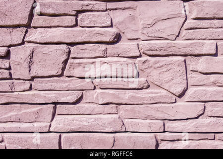 Old pink light Bricks Wall Pattern decoration texture or broken brick wall background light for loft interior or exterior. Porous concrete fence Stock Photo