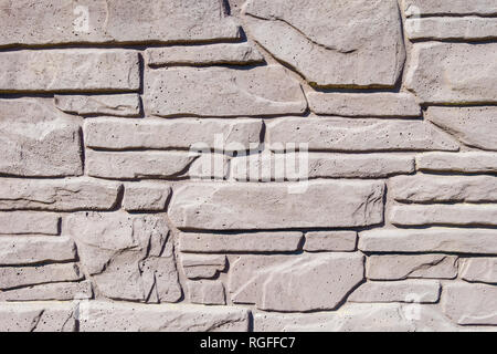 Old gray light Bricks Wall Pattern decoration texture or broken brick wall background light for loft interior or exterior. Porous concrete fence Stock Photo