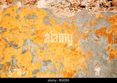 Grunge yellow wall as background Stock Photo
