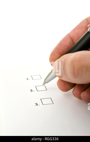 Closeup of survey and consumer hand choosing one of three options. Stock Photo
