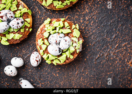 Easter  cookies in shape of nest with eggs Stock Photo