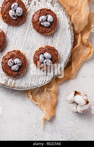 Easter  cookies in shape of nest with eggs Stock Photo