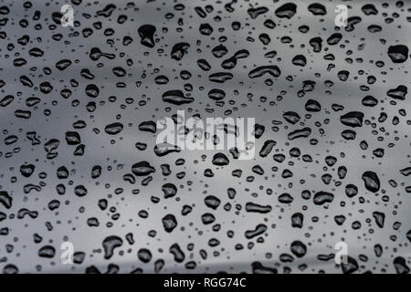 drops of water on the car after rain - Image Stock Photo