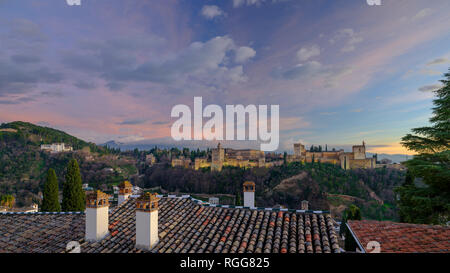 The Alhambra and Generalife Palaces at sunset looking over the roofs of the Albaicin, Grenada, Spain Stock Photo