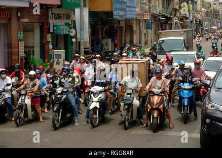 People riding motorcycles in Ho Chi Minh city, Vietnam, Asia Stock Photo