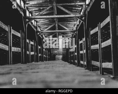 Interior of wooden barracks, living accommodation, Auschwitz-II Birkenau concentration and extermination camp, Oswiecim, Poland Stock Photo