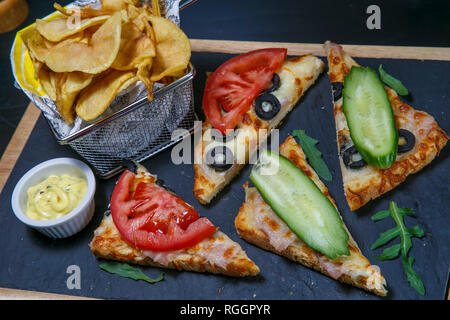 Sandwich with rye brown bread, ripe tomatoes, cucumbers and tuna fish for healthy snack Stock Photo