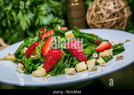 Salad with summer fruits and fresh vegetables, closeup Stock Photo