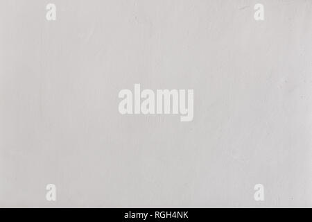 wall with rough texture painted white. Horizontal composition. Stock Photo