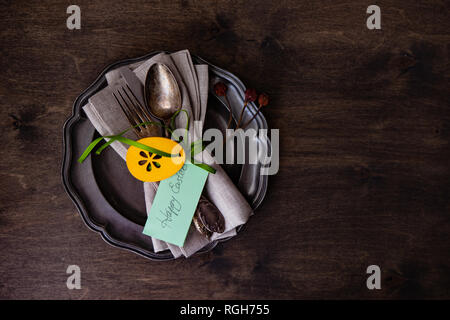 Festive easter table setting with colored eggs and easter bunny concept with copyspace Stock Photo