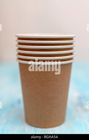 Brown disposable paper cups for drinks. Stock Photo