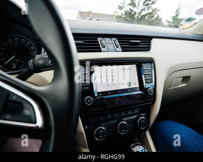 FRANKFURT, GERMANY - JUNE 22, 2018: Google Andoid Auto on the new luxury car dahsboard digital screen display showing the dial a number telephone setting Stock Photo
