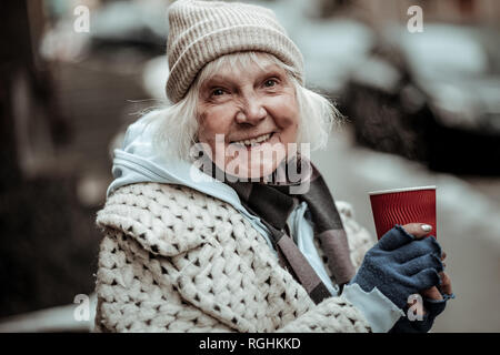 Portrait of a cheerful nice aged woman Stock Photo