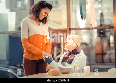Nice aged woman being full of gratitude Stock Photo