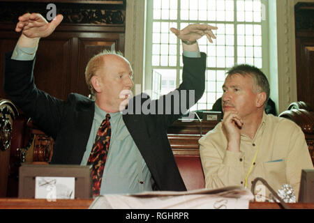 Gerry Adams's former driver, Terence 'Cleeky' Clarke (seen here on left)  in Belfast City Hall, Belfast, County Antrim. Terence 'Cleaky' Clarke (died 13 June 2000), older brother of Seamus; acted as a body guard to Gerry Adams; was imprisoned for seven years after being convicted of assaulting Corporal Derek Wood. He was on IRA active service on the South Armagh border for several months and in Derry after Bloody Sunday, but was caught in August 1972.