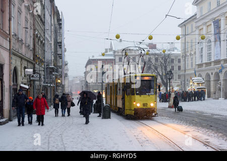 Lviv, Ukraine - January 5, 2019: Tram on Market square in winter time Stock Photo