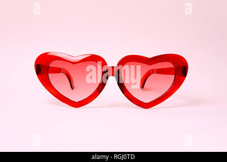 A pair of red heart shaped sun glasses. Stock Photo