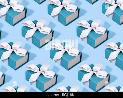 Pattern made of blue gift boxes. Stock Photo