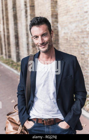 Portrait of a mature man in the city Stock Photo