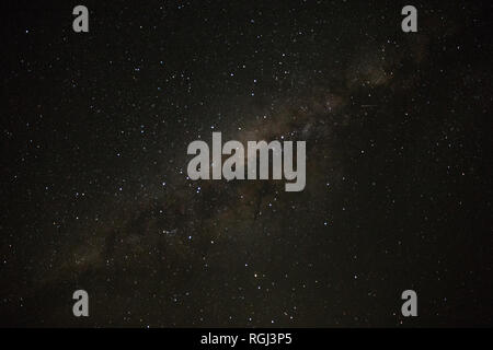 The milky way seen over the rocky mountains of Spitzkoppe in Namibia Stock Photo