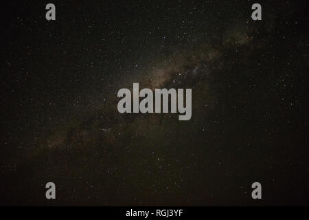 The milky way seen over the rocky mountains of Spitzkoppe in Namibia Stock Photo