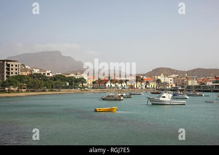 Harbor with fishing boats & the water front of Mindelo on Sao Vicente Island, Cape Verde Islands. Stock Photo