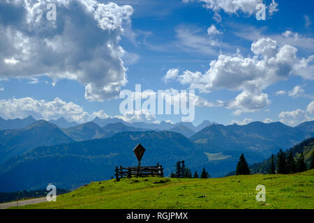 Austria, Tyrol, Juifen, Rotwand mountain pasture, summit cross Stock Photo