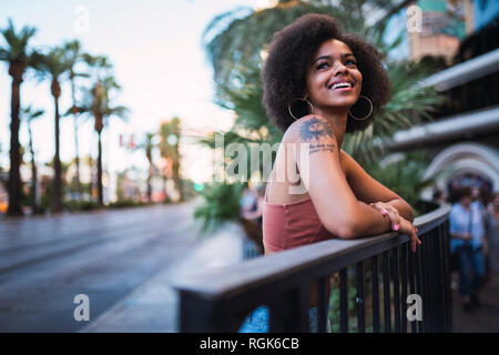 USA, Nevada, Las Vegas, portrait of happy young woman in the city Stock Photo