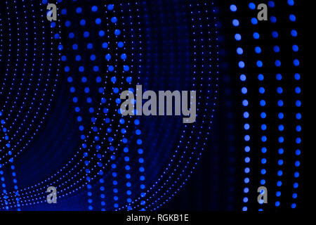 Blue curved lines of abstract points. Light painting photography. Stock Photo